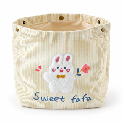 Wukusy foldable fabric storage basket with snap closure, ideal for toys, clothes, and home organization.