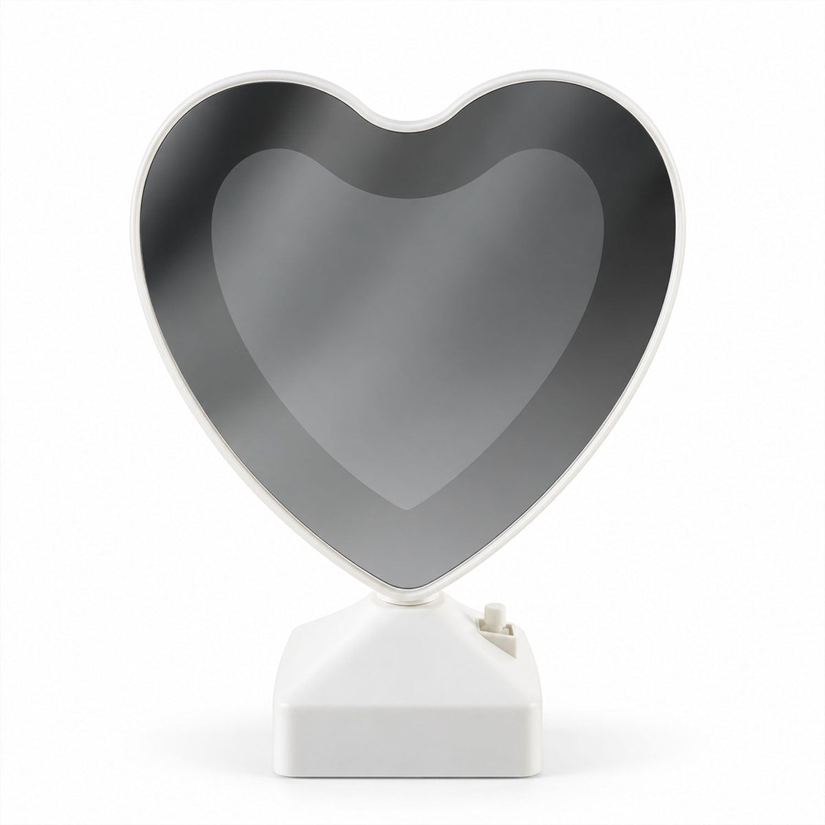 Heart-shaped LED mirror photo frame with warm light, tabletop home decor by Wukusy, displaying a personal photo inside.
