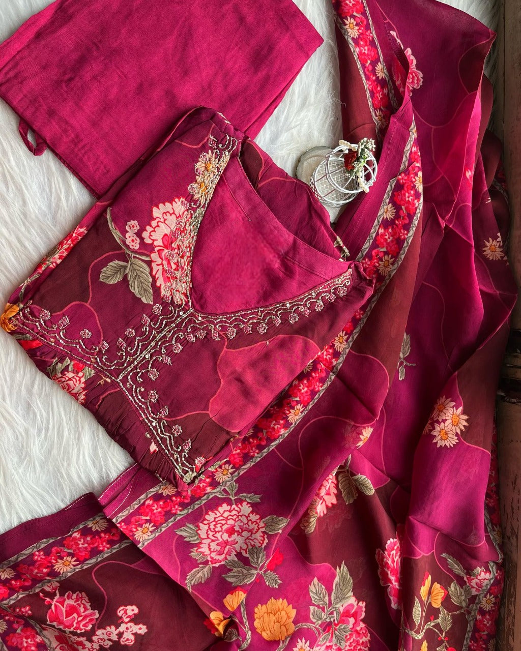 Red Awesome Embroidered Suit from Drpshippr, featuring intricate embroidery on vibrant red fabric, stylish and elegant for special occasions.