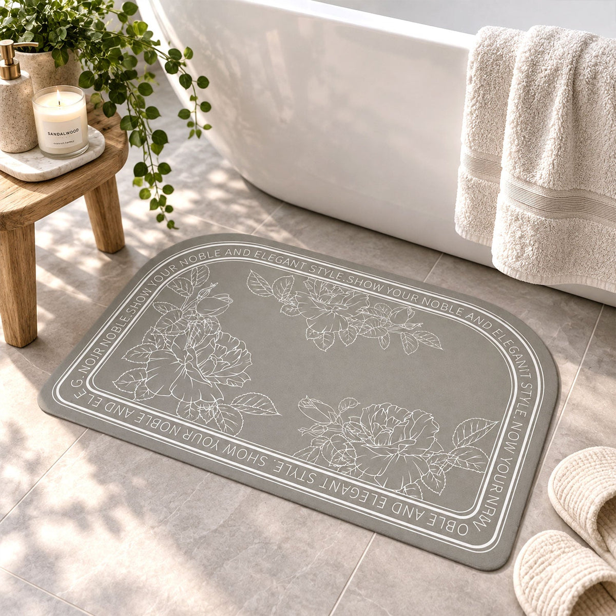 Wukusy absorbent bathroom mat with half-round floral print, quick-drying fabric, measuring 50x80 cm, placed on bathroom floor.