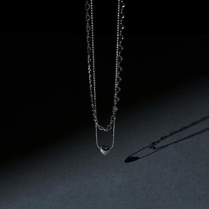 Silver necklace with Salty Falling In Love pendant, featuring elegant design and intricate detailing from Drpshippr.