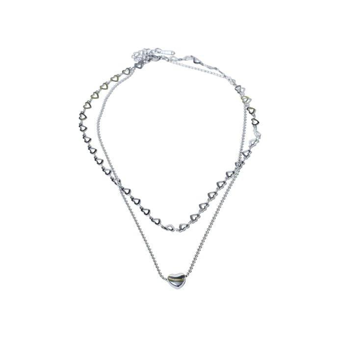 Silver necklace with Salty Falling In Love pendant, stylish jewelry by Drpshippr, displayed on a neutral background.