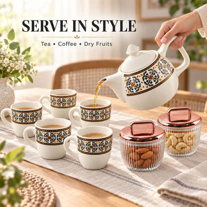 Wukusy tea gift set with kettle, 6 cups, and 2 dry fruit jars, displayed on a wooden table with tea accessories.