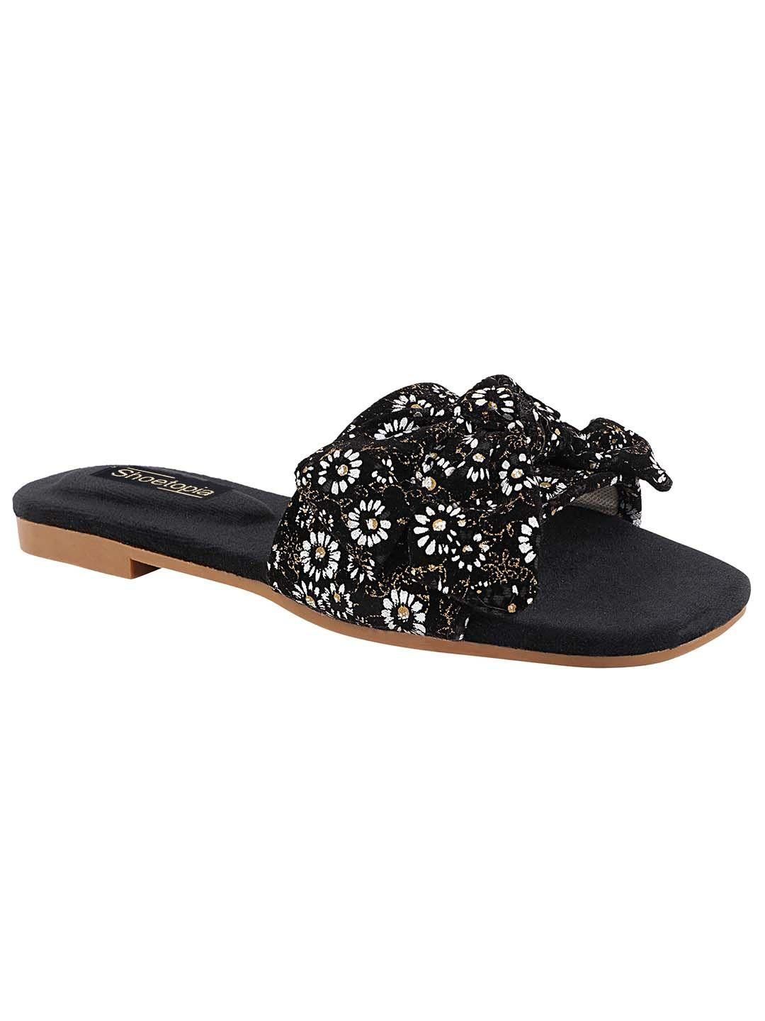 Pair of Shoetopia women's flats from Drpshippr's men's collection, showcasing comfortable slip-on shoes in black.