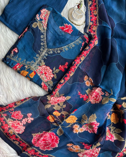 SkyBlue embroidered designer suit by Drpshippr, featuring intricate embroidery and elegant fabric, suitable for formal occasions.