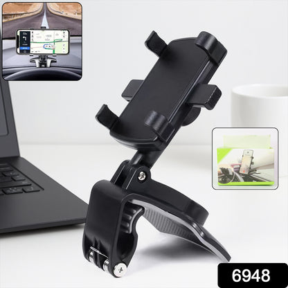 Wukusy universal car dashboard and desk mobile phone holder mounted on a vehicle dashboard showing phone placement