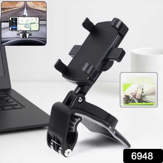 Wukusy universal car dashboard and desk mobile phone holder mounted on a vehicle dashboard showing phone placement