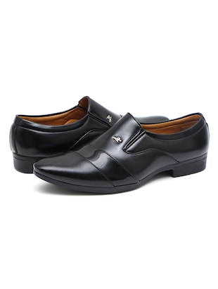 Solid black slip on shoes