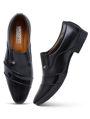 Solid black slip on shoes