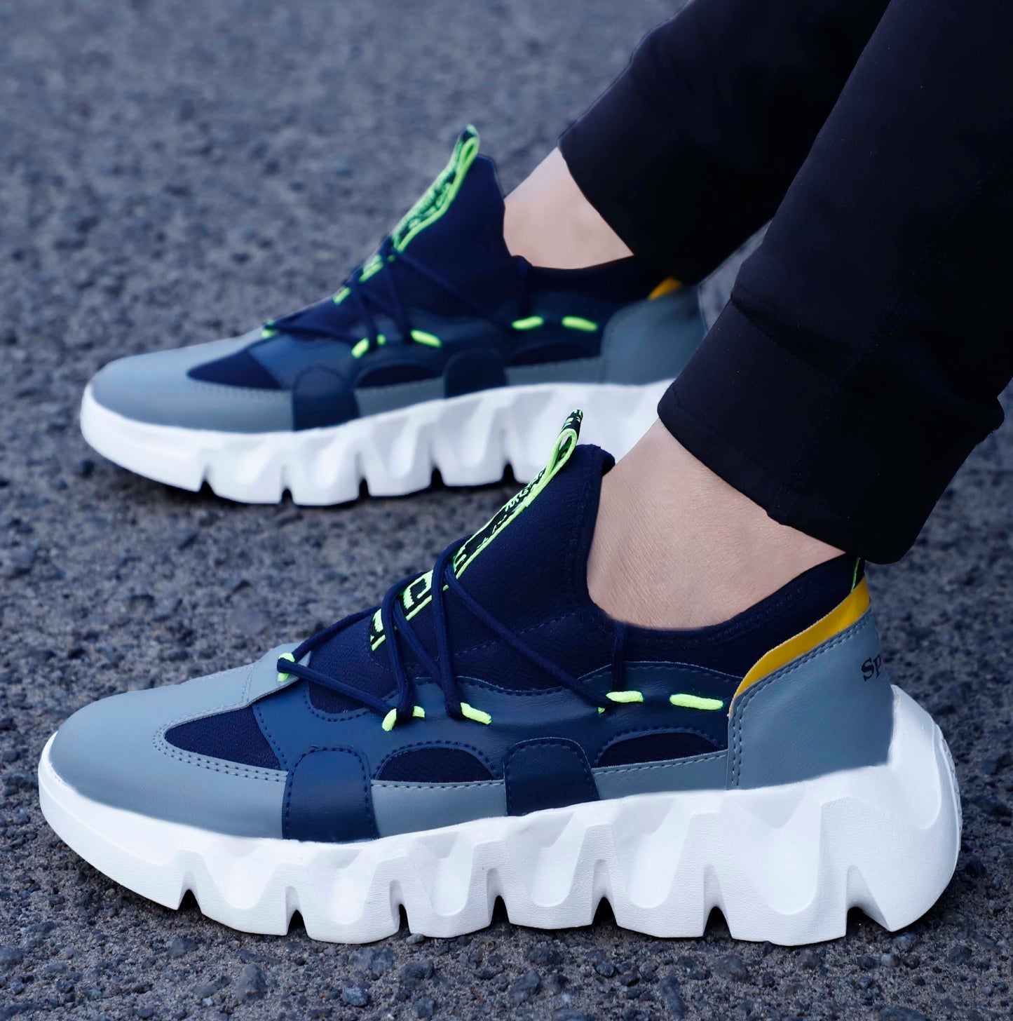 Pair of Drpshippr sports shoes for outdoor activities, featuring breathable mesh and athletic design.
