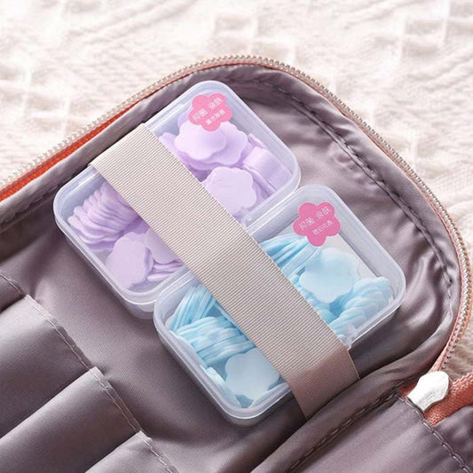 Set of 100 Wukusy mini portable travel soap paper sheets in colorful flower shapes, ideal for home and travel hygiene.