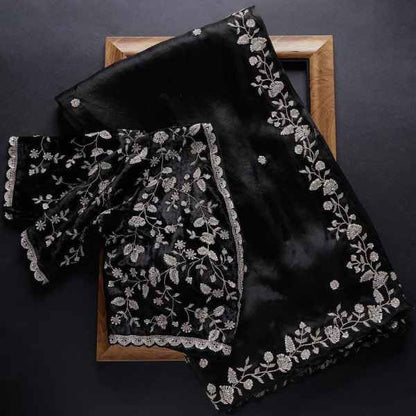 Black Rangoli silk saree from Drpshippr with intricate design and matching blouse piece, perfect for traditional women’s wear.