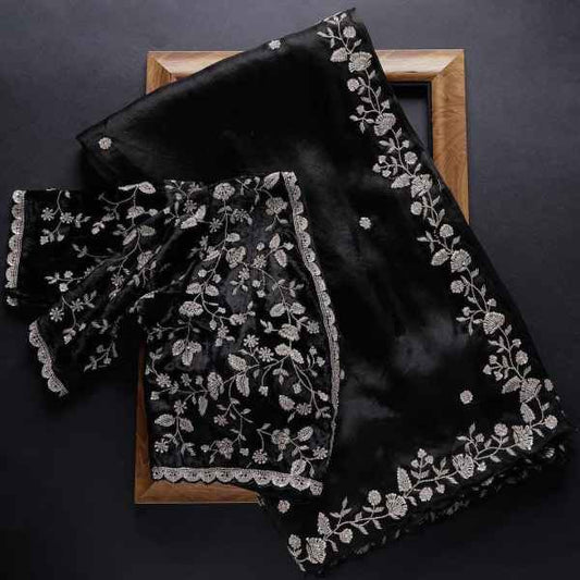 Black Rangoli silk saree from Drpshippr with intricate design and matching blouse piece, perfect for traditional women’s wear.