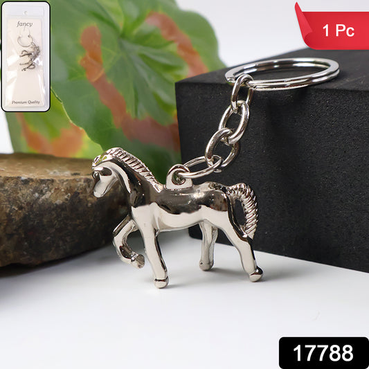 Shiny metallic horse-shaped keychain from Wukusy, featuring a detailed horse design on a silver finish.