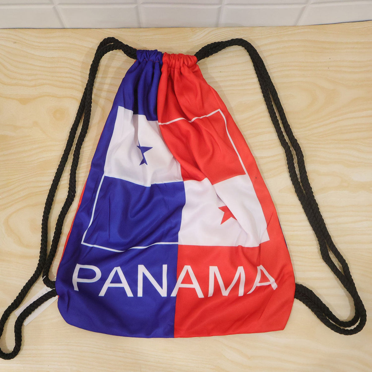 Wukusy printed drawstring backpack with braided cords for sports or gym, 40x33 cm, shown with colorful design and adjustable straps.