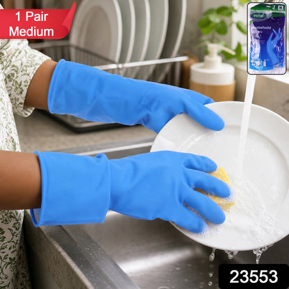 Pair of Medium Wukusy Victor Blue cleaning rubber gloves for kitchen dishwashing, reusable and designed for effective cleaning.