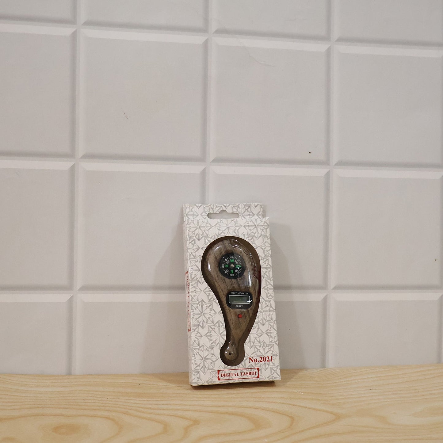 Wukusy wooden digital tasbih counter with LCD display, handheld mantra jaap counter, includes compass, showing close-up of device with wooden finish.