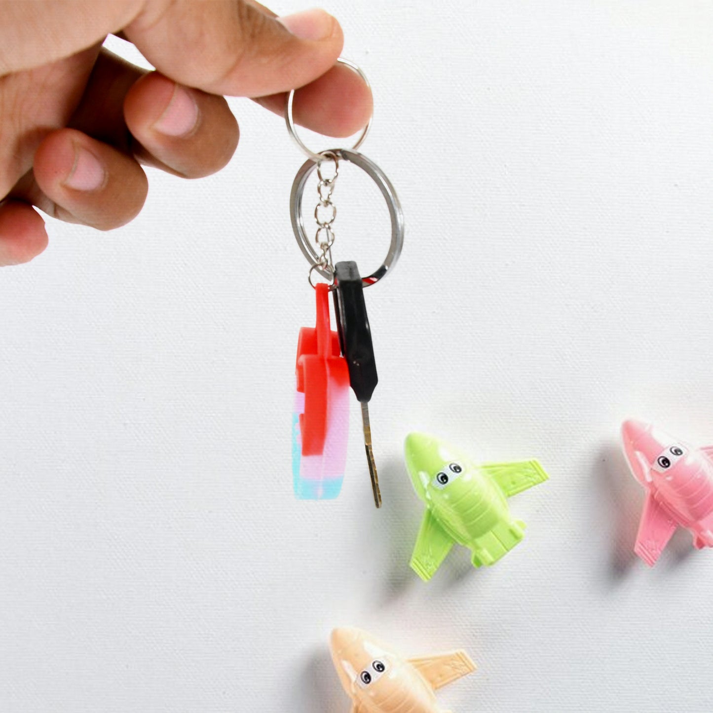 Wukusy Compact Silicone Pop It keychain toy with colorful bubbles, portable stress relief fidget toy for kids' birthday gifts