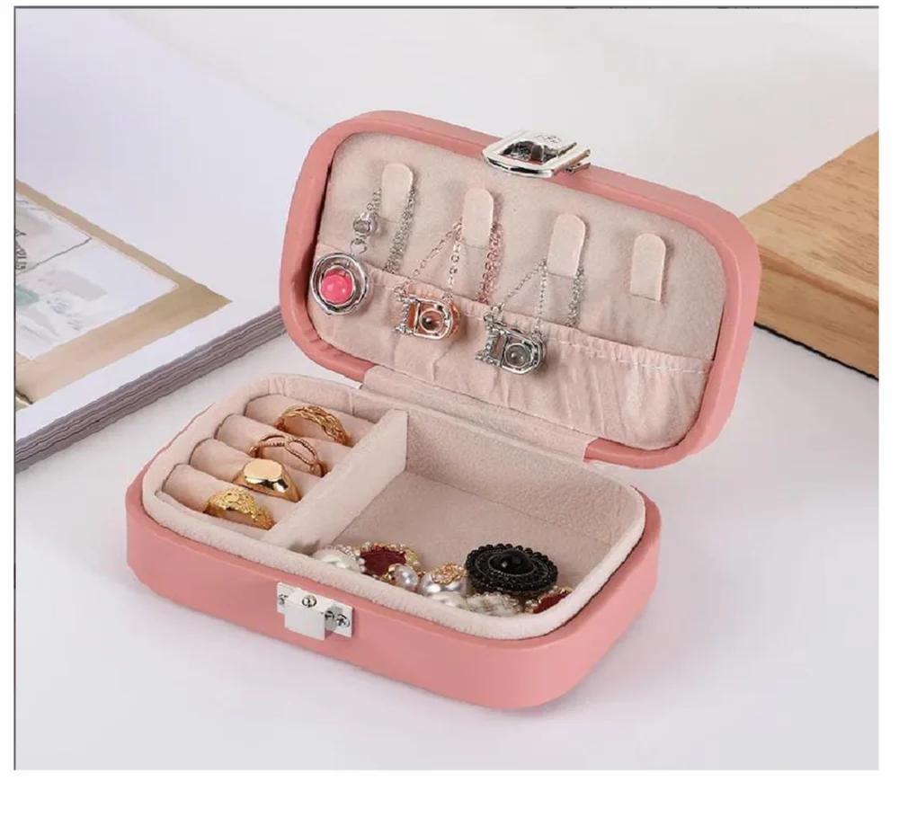 Drpshippr travel jewelry case and organizer with multiple compartments for storing necklaces, rings, and earrings during travel.