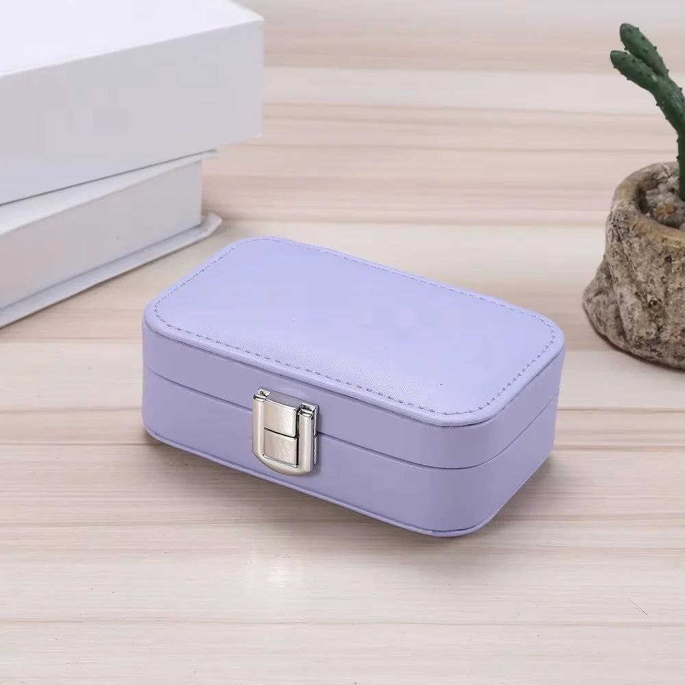 Travel jewelry case by Drpshippr, compact jewelry organizer with multiple compartments for easy storage and travel.