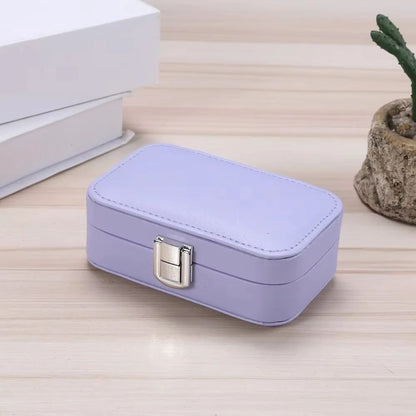 Travel jewelry case by Drpshippr, compact jewelry organizer with multiple compartments for easy storage and travel.