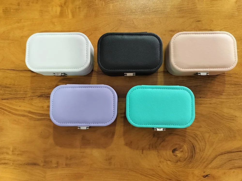 Drpshippr travel jewelry case and organizer with compartments for necklaces, rings, and earrings, ideal for travel storage.