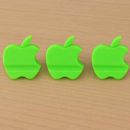 Three colorful apple-shaped plastic mobile phone holders in a mix of vibrant colors, designed for stable phone support.