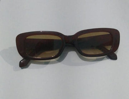 Unisex square frame sunglasses with black lenses and sleek black temples, stylish eyewear by Drpshippr.