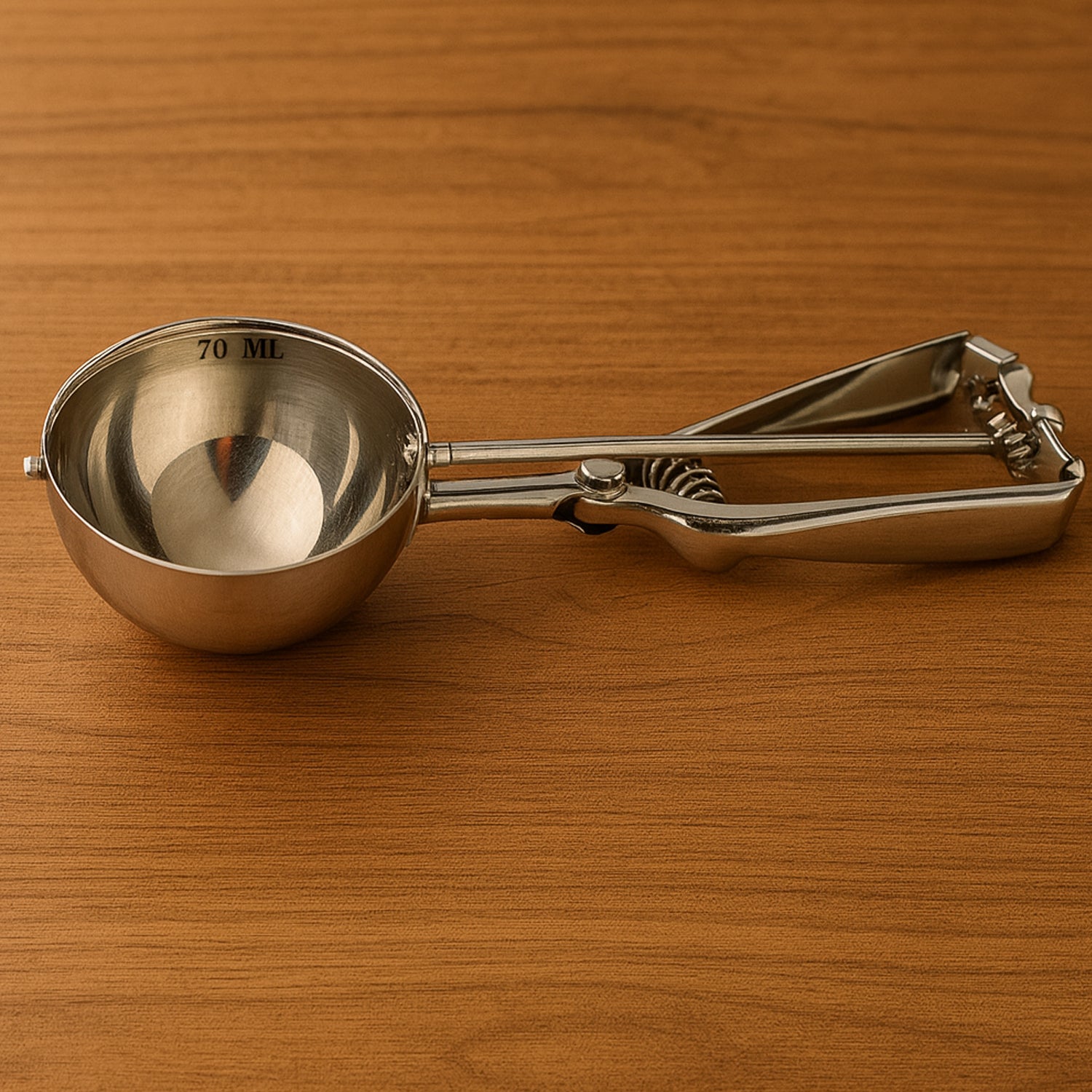 Wukusy stainless steel ice cream scoop with trigger release, 70ml capacity, showing the scoop with trigger mechanism and polished finish.