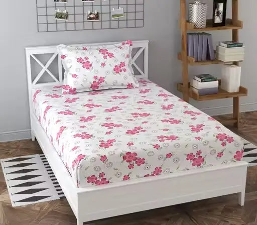 Ekom floral cotton king size fitted bedsheet with two pillow covers, featuring vibrant flower patterns on soft fabric.