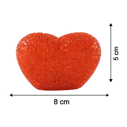 Heart-shaped LED night lamp with crystal texture emitting a soft red glow, perfect for cozy bedroom decor by Wukusy.
