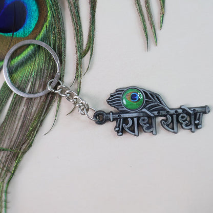 Metal Radha Krishna Radhe Radhe keychain featuring intricate design, perfect for religious or decorative use by Wukusy.