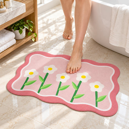 Decorative floral bathroom floor mat with wavy border design, Wukusy 59x40 cm, featuring colorful floral patterns and soft, non-slip backing.