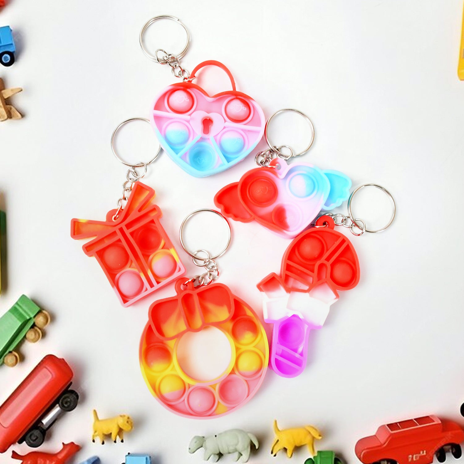 Wukusy Compact Silicone Pop It keychain toy with colorful bubble design, portable fidget stress relief toy for kids and birthdays
