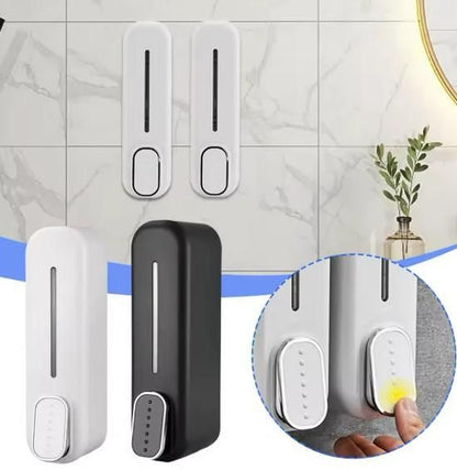Wall-mounted manual soap dispenser by Drpshippr, designed for home decor and lighting, with a sleek, functional wall installation.
