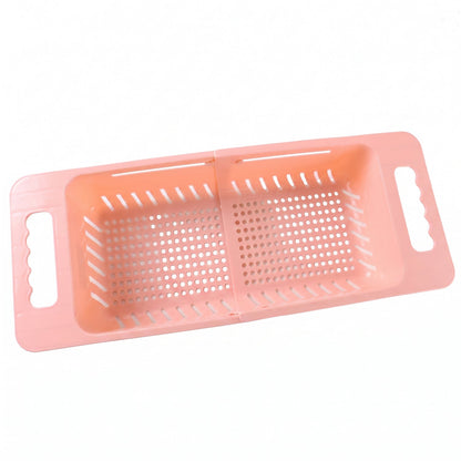 Wukusy adjustable plastic over-the-sink drain basket colander with handles for draining fruits, vegetables, and pasta.