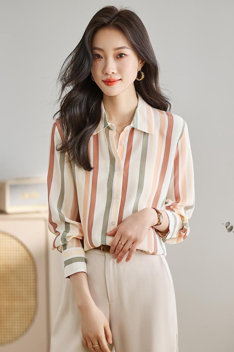 Woman wearing a regular fit printed casual button-up shirt from Drpshippr's men's collection, featuring vibrant patterns and a relaxed style.