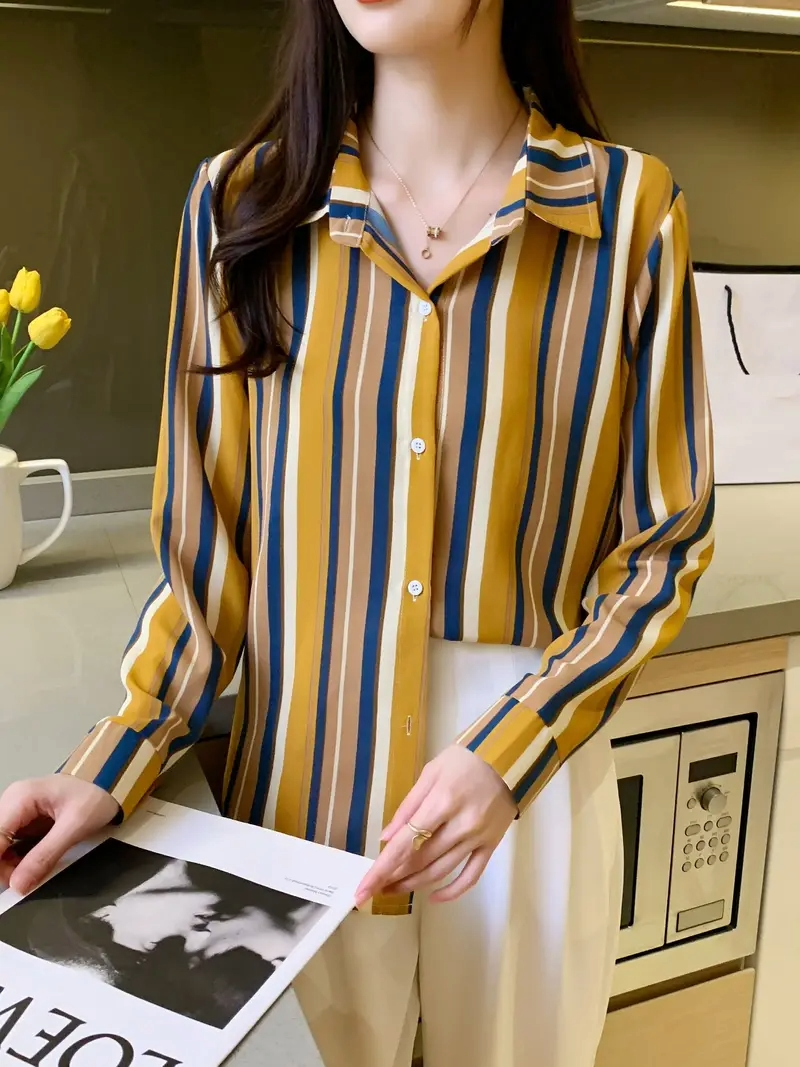 Woman wearing a striped print cotton silk long sleeve collar neck tunic shirt from Drpshippr's women's collection.