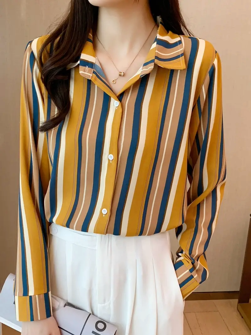 Woman wearing a striped print cotton silk long sleeve collar neck tunic shirt from Drpshippr's women's collection.