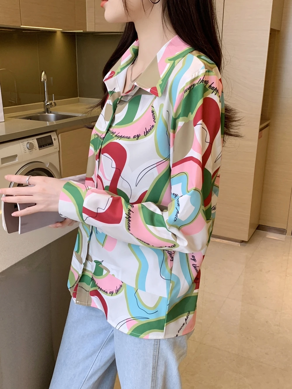 Woman wearing a regular fit floral print casual shirt from Drpshippr's men's collection, featuring vibrant floral patterns.