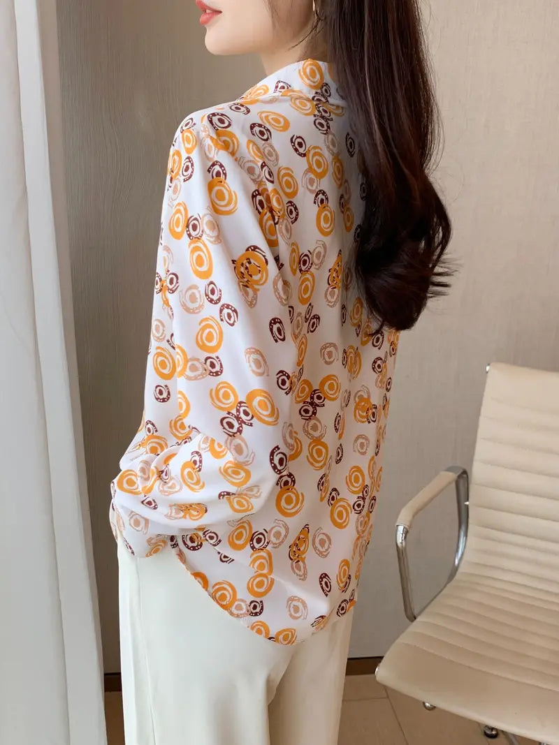 Woman wearing a relaxed fit printed formal shirt from Drpshippr's men's collection, showcasing casual yet professional style.