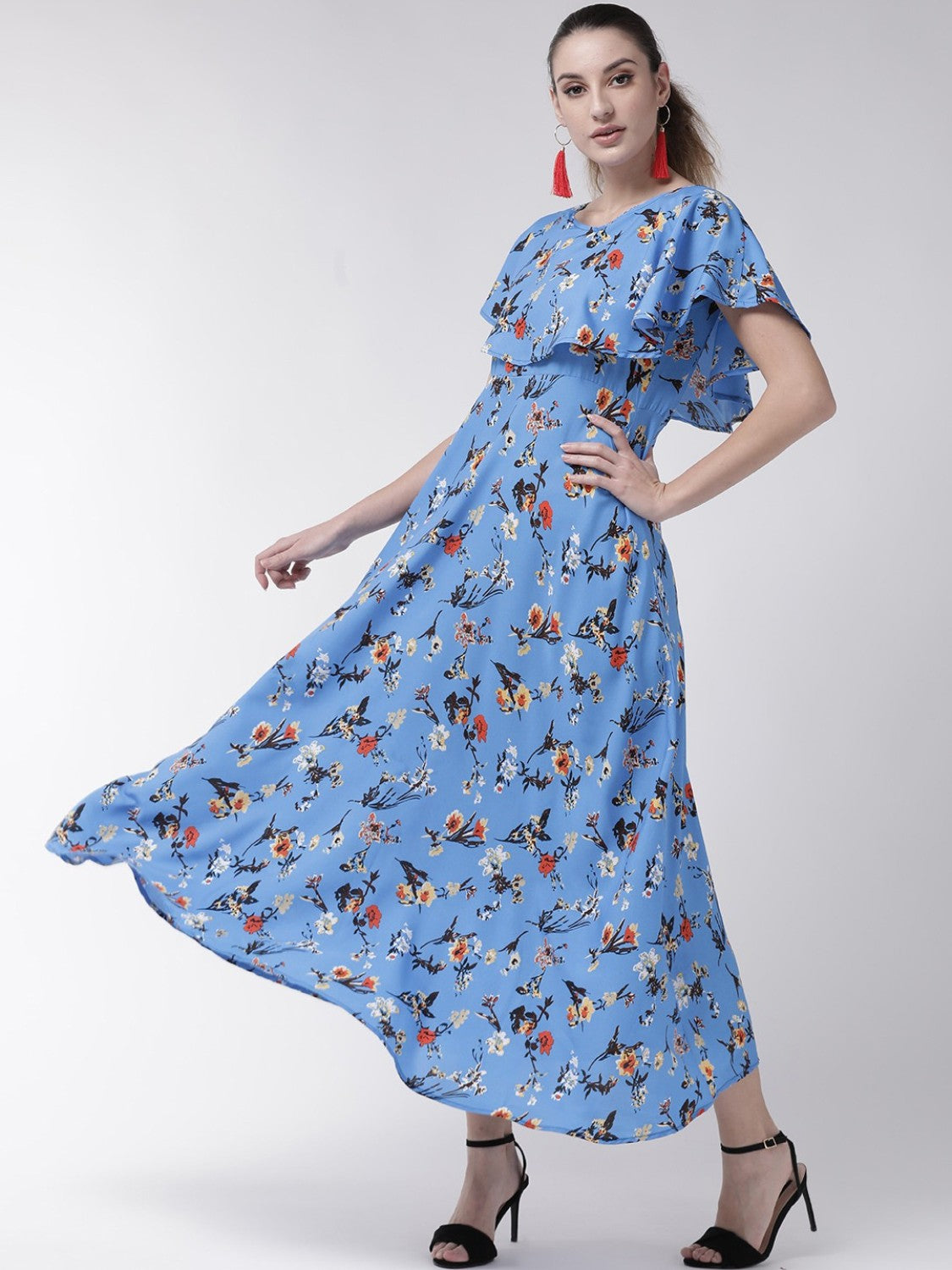 Women’s blue cape sleeve maxi dress from Drpshippr, featuring flowing fabric and elegant cape-style sleeves.