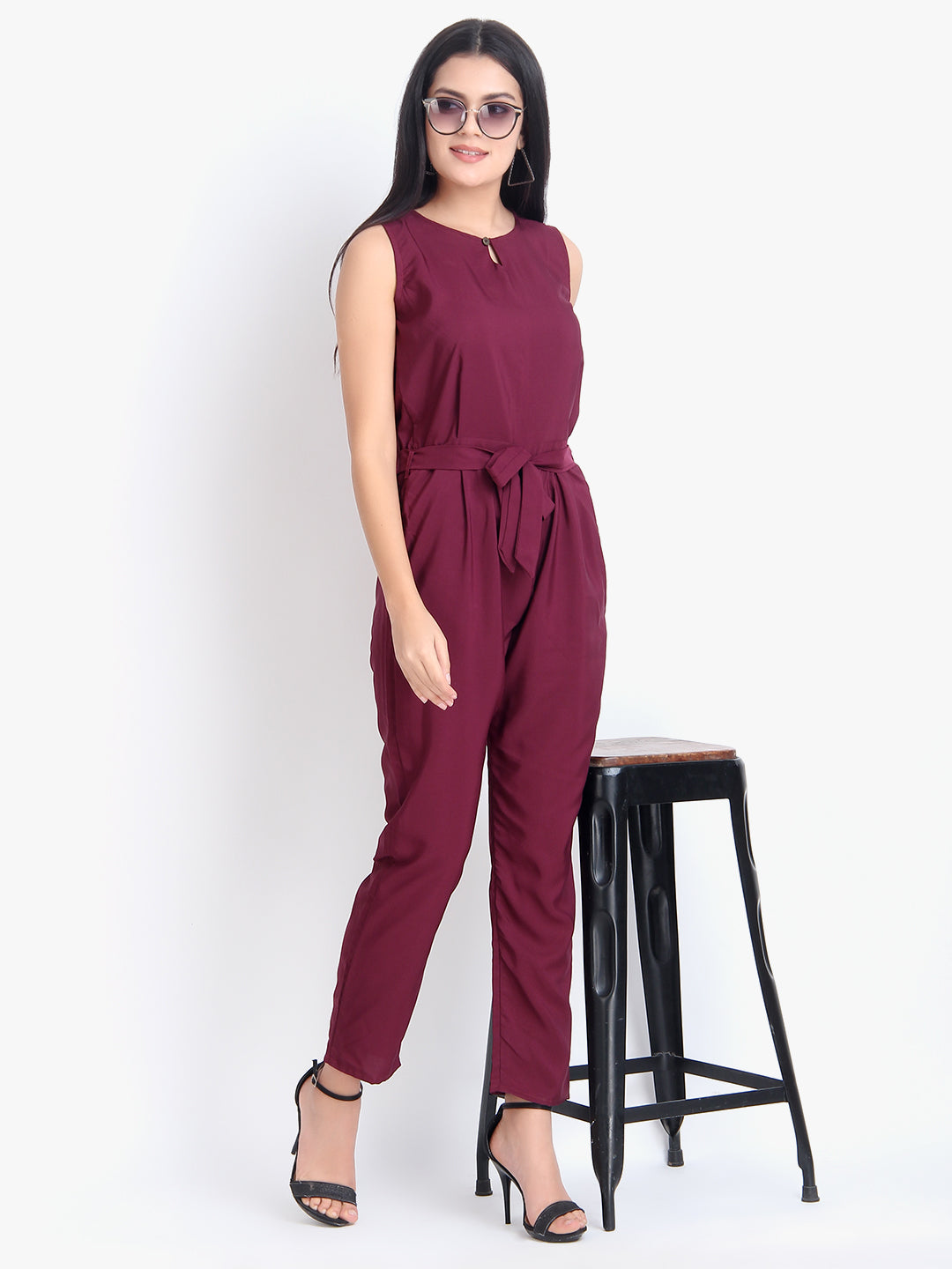 Women wearing a maroon sleeveless crepe jumpsuit from Drpshippr's casual full-length collection.