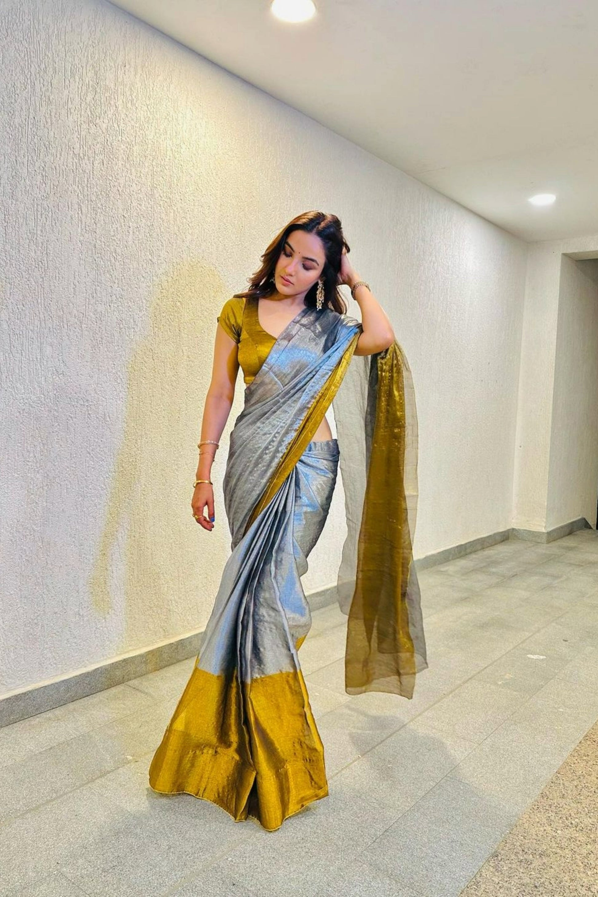 Elegant women's linen saree with intricate sequin work from Drpshippr, showcasing detailed craftsmanship and stylish design.
