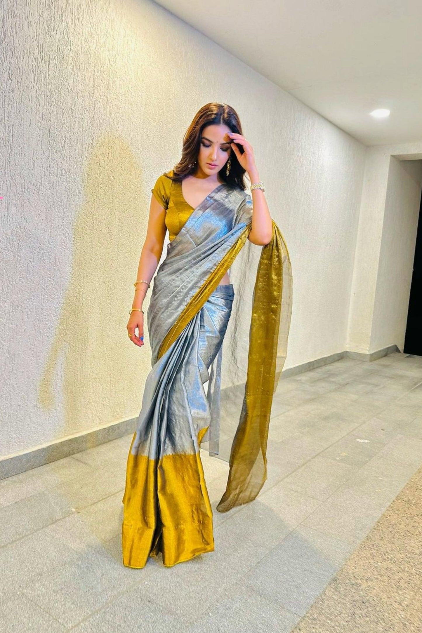 Women's linen saree with intricate sequin work from Drpshippr's Women's Collection, showcasing elegant craftsmanship and vibrant design.