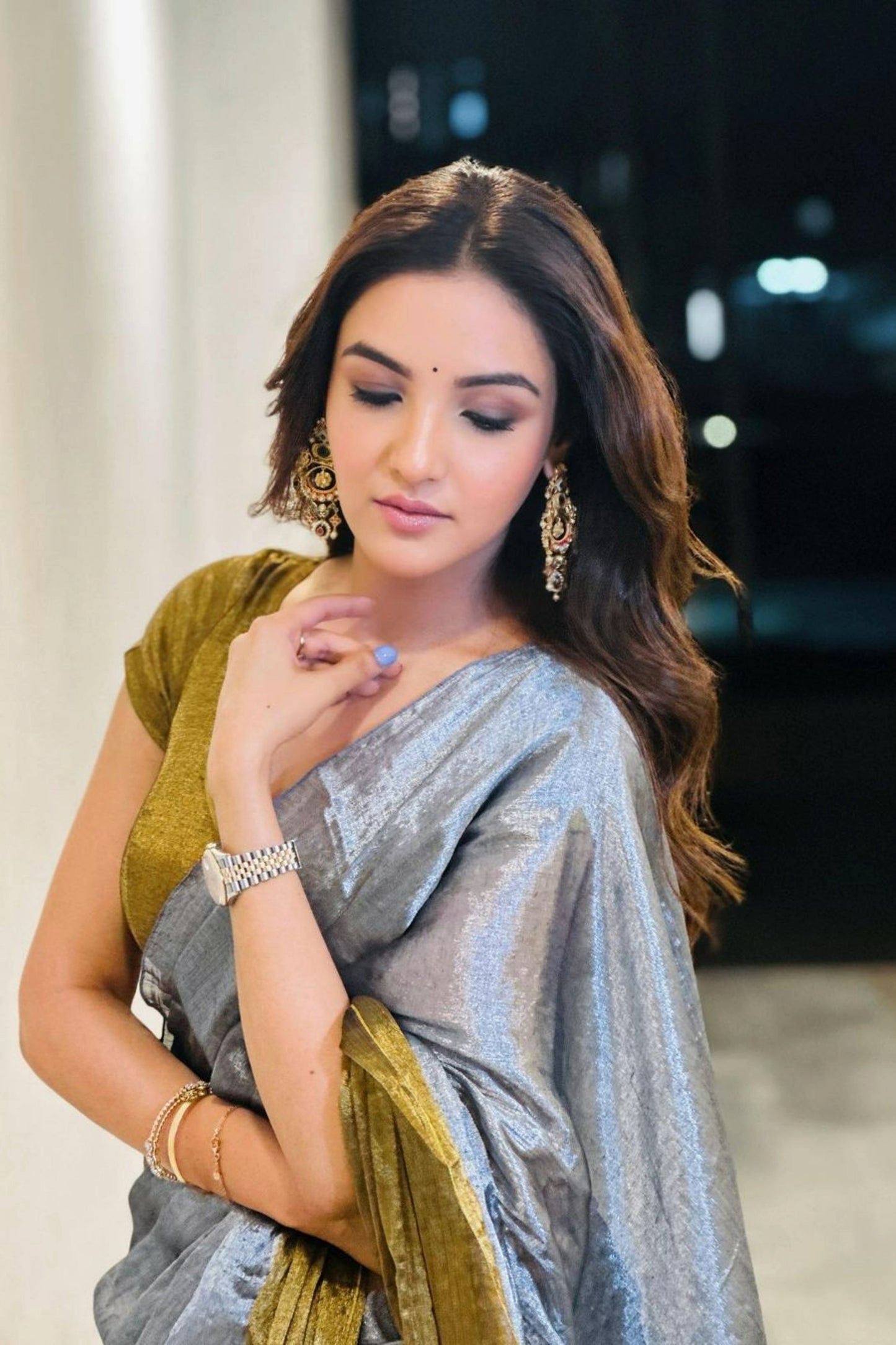 Beautiful women's linen saree with intricate sequin work from Drpshippr, showcasing elegant craftsmanship and stylish design.