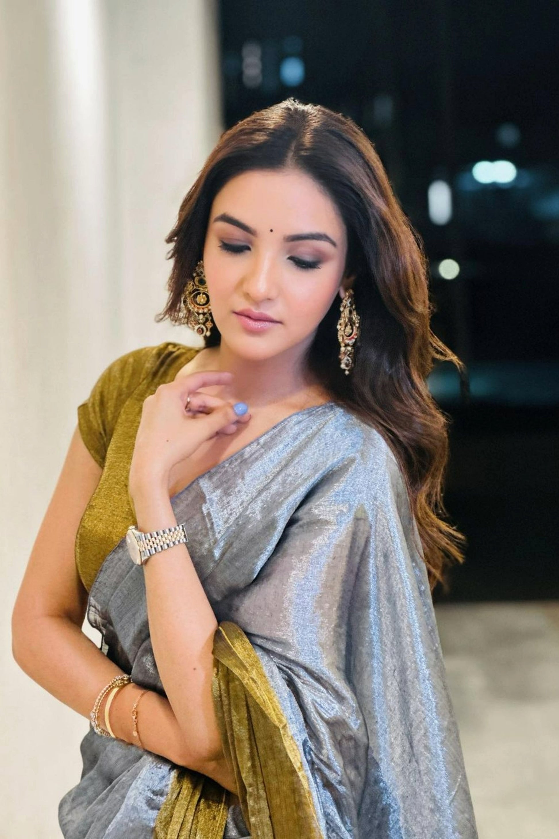 Beautiful women's linen saree with intricate sequin work from Drpshippr, showcasing elegant craftsmanship and stylish design.