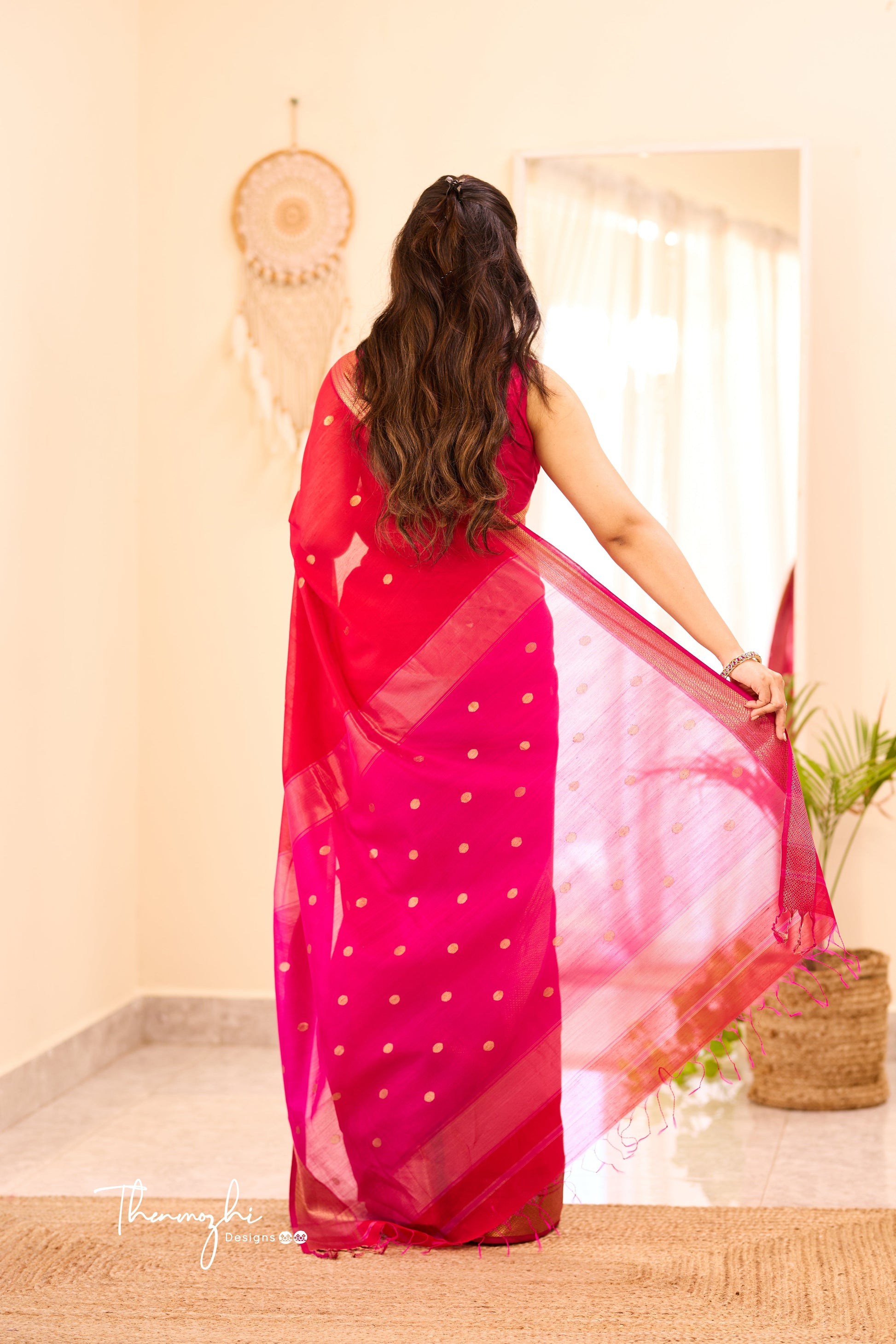 Women's linen saree with intricate sequin work from Drpshippr's women's collection, featuring elegant draping and detailed embroidery.