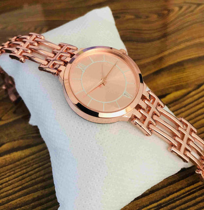Women's stainless steel analog watch from Drpshippr's men's collection, featuring a sleek design with a round dial and metal band.