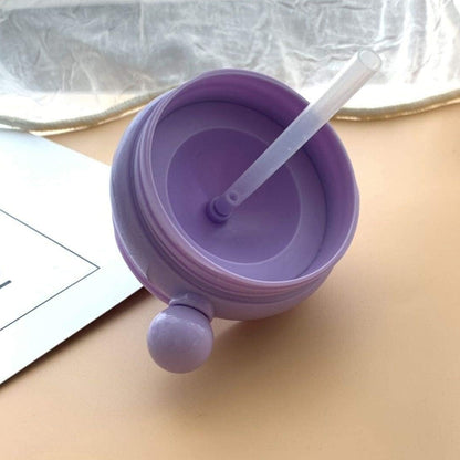 Wukusy Baby Drinking Cup with straw, lid, and whale spray fountain, spill-proof toddler tumbler for children.